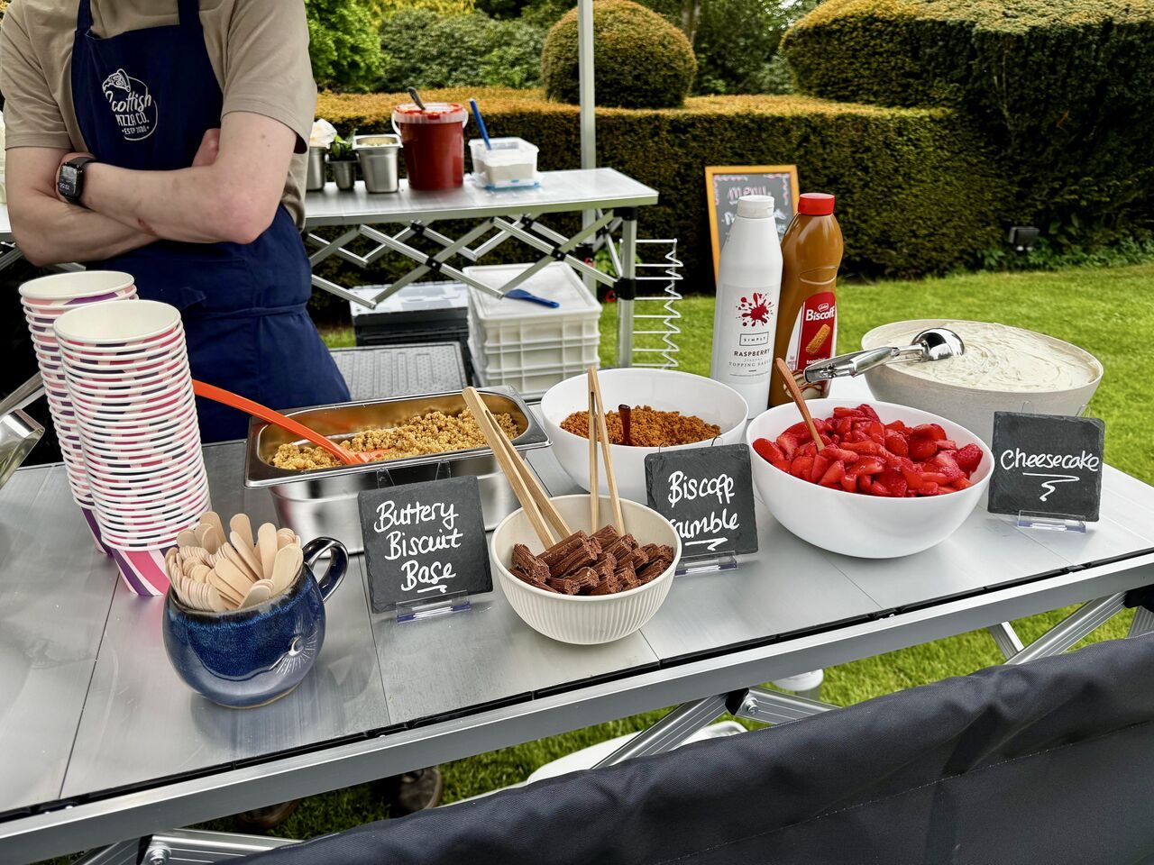 Dessert bar with buttery biscuit base, toppings and chalkboard labels